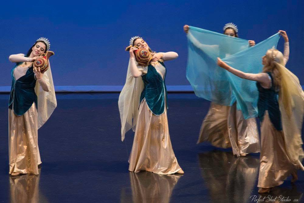 Dancers with jugs and veils from The Journey